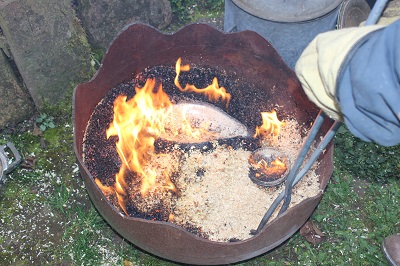 le feu en action - cuisson raku céramique